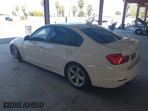 2013 BMW 3 Series 328i with VIN WBA3C1C50DF438180, listed as a IAAI auction lot 42082401 with 206,412 mi miles. Bid and sale history available at carsss.com. Image 3.