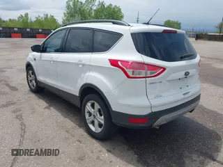 2014 Ford Escape SE with VIN 1FMCU9GX6EUD51032, listed as a IAAI auction lot 42206659 with 131,438 mi miles and . Bid and sale history available at DreamBid. Image 3.