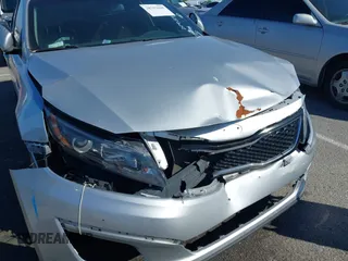 2015 Kia Optima LX with VIN 5XXGM4A77FG431285, listed as a IAAI auction lot 38792800 with 99,378 mi miles and . Bid and sale history available at DreamBid. Image 6.