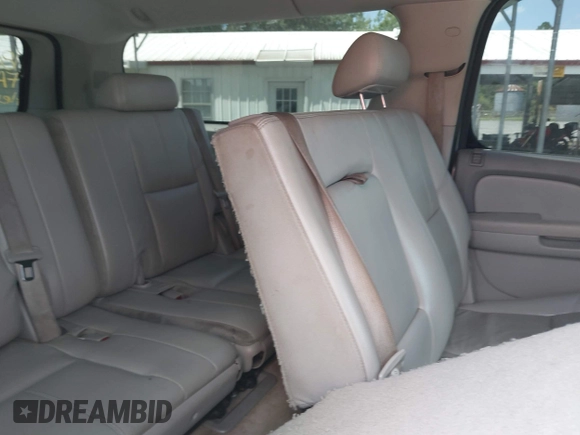 2007 Chevrolet Suburban LT z VIN 1GNFC160X7R218023, wystawiony jako IAAI lot #42305941 z przebiegiem 237 987 mil mil oraz . Historia ofert i sprzedaży dostępna na DreamBid. Obrazek 8.
