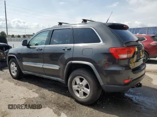 2011 Jeep Grand Cherokee Laredo z VIN 1J4RR4GG2BC518713, wystawiony jako Copart lot #55947995 z przebiegiem 119 783 mil mil oraz Szkoda całkowita • Salvage title. Historia ofert i sprzedaży dostępna na DreamBid. Obrazek 2.