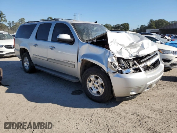2011 Chevrolet Suburban LS with VIN 1GNSCHE03BR292854, listed as a Copart auction lot 82693424 with 187,104 mi miles and Salvage Title. Bid and sale history available at carsss.com. Image 4.