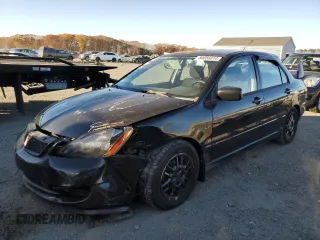 2006 Mitsubishi Lancer OZ-Rally with VIN JA3AJ86E16U059013, listed as a Copart auction lot 80056014 with 107,179 mi miles and Clean Title. Bid and sale history available at DreamBid. Image 1.