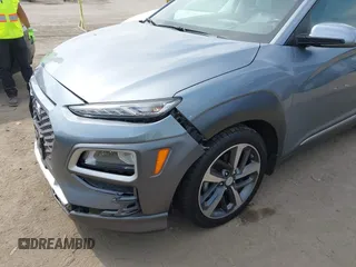 2019 Hyundai Kona Ultimate with VIN KM8K53A58KU198498, listed as a IAAI auction lot 42046679 with 57,327 mi miles and . Bid and sale history available at carsss.com. Image 19.