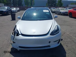 2023 Tesla Model 3 with VIN 5YJ3E1EA0PF621448, listed as a IAAI auction lot 42500155 with 26,589 mi miles and . Bid and sale history available at DreamBid. Image 13.