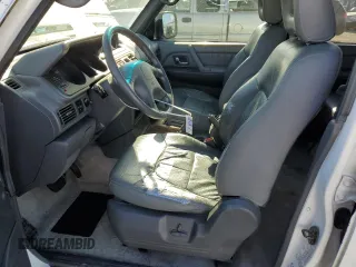 1999 Mitsubishi Montero z VIN JA4MR51R9XJ007139, wystawiony jako Copart lot #41682545 z przebiegiem 200 002 mil mil oraz Czysty tytuł • Clean title. Historia ofert i sprzedaży dostępna na DreamBid. Obrazek 7.