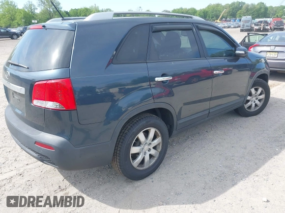 2011 Kia Sorento LX with VIN 5XYKT4A27BG085049, listed as a IAAI auction lot 42249462 with 218,039 mi miles and . Bid and sale history available at DreamBid. Image 4.