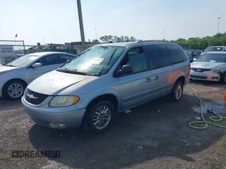2003 Chrysler Town & Country Limited with VIN 2C8GP64L23R202901, listed as a IAAI auction lot 42078656 with 255,974 mi miles. Bid and sale history available at carsss.com. Image 2.