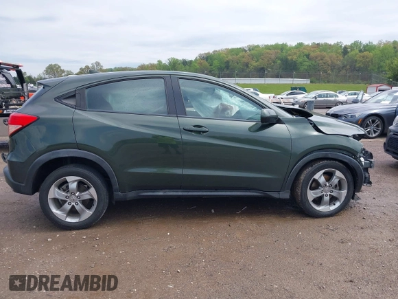 2017 Honda HR-V LX with VIN 3CZRU6H31HG705873, listed as a IAAI auction lot 41965086 with 130,744 mi miles. Bid and sale history available at carsss.com. Image 13.
