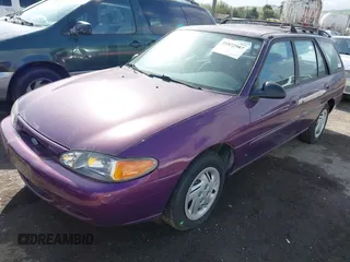 1997 Ford Escort LX with VIN 3FALP15P9VR137438, listed as a IAAI auction lot 41872987 with 134,606 mi miles. Bid and sale history available at carsss.com. Image 2.