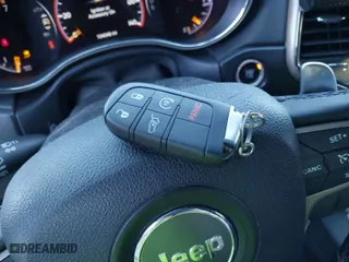 2015 Jeep Grand Cherokee Altitude with VIN 1C4RJFAG6FC796571, listed as a IAAI auction lot 41258471 with 104,049 mi miles. Bid and sale history available at carsss.com. Image 11.