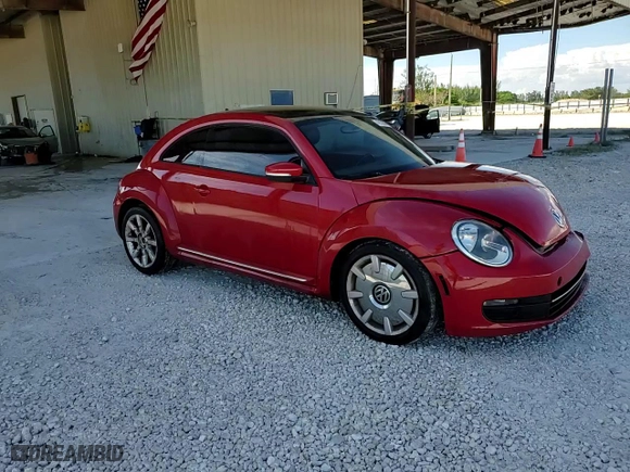 2012 Volkswagen Beetle 2.5L with VIN 3VWJX7AT7CM662822, listed as a Copart auction lot 74215804 with 115,890 mi miles and Salvage Title. Bid and sale history available at carsss.com. Image 13.