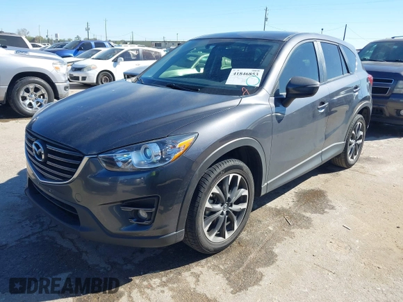 2016 Mazda CX-5 Grand Touring with VIN JM3KE2DYXG0784615, listed as a IAAI auction lot 41846853 with 72,185 mi miles. Bid and sale history available at carsss.com. Image 17.