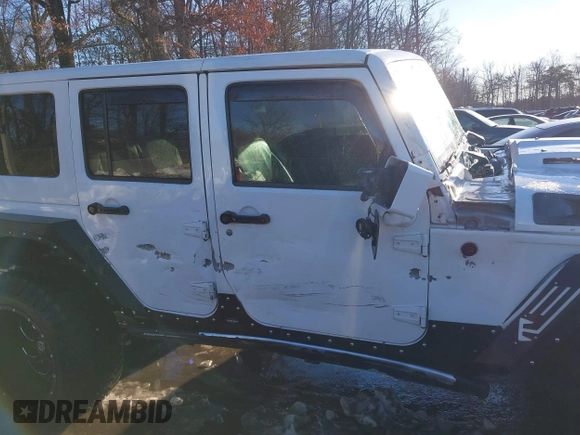 2014 Jeep Wrangler Unlimited Sahara with VIN 1C4HJWEG2EL273813, listed as a IAAI auction lot 41311011 with 96,104 mi miles. Bid and sale history available at carsss.com. Image 13.