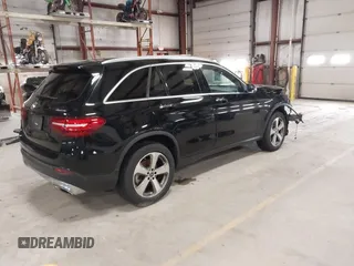 2019 Mercedes-Benz GLC with VIN WDC0G4KB1KV171258, listed as a IAAI auction lot 41895553 with 77,363 mi miles. Bid and sale history available at carsss.com. Image 4.
