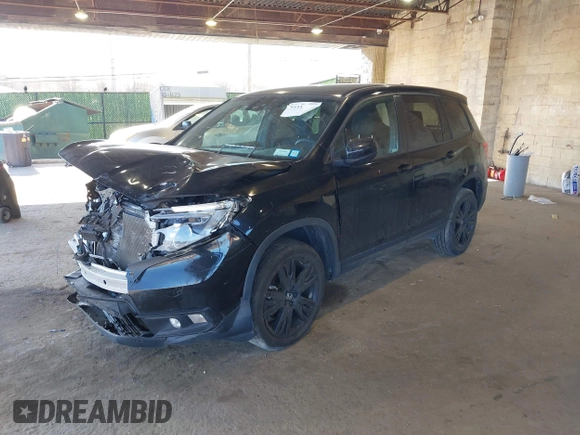 2021 Honda Passport Sport with VIN 5FNYF8H27MB021098, listed as a IAAI auction lot 41333241 with 101,239 mi miles and . Bid and sale history available at DreamBid. Image 17.