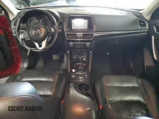 2016 Mazda CX-5 Grand Touring with VIN JM3KE4DY1G0669316, listed as a Copart auction lot 79961554 with 117,454 mi miles and Salvage Title. Bid and sale history available at carsss.com. Image 8.