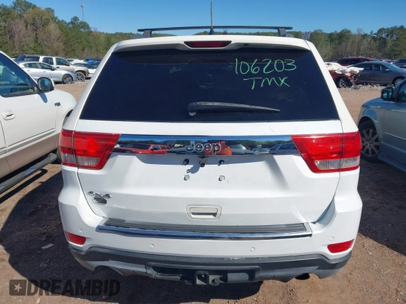 2012 Jeep Grand Cherokee Laredo with VIN 1C4RJEAG5CC106203, listed as a IAAI auction lot 41821138 with 157,474 mi miles. Bid and sale history available at carsss.com. Image 16.