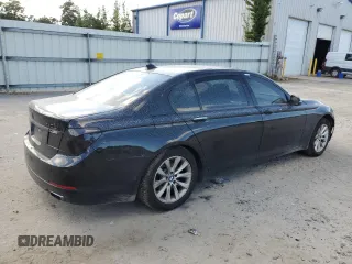 2015 BMW 7 Series 740Li with VIN WBAYE4C58FD138919, listed as a Copart auction lot 69409074 with 145,549 mi miles and Salvage Title. Bid and sale history available at DreamBid. Image 3.