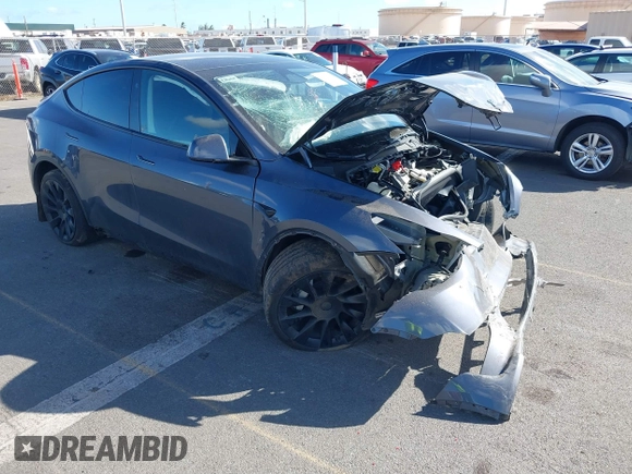 2023 Tesla Model Y Long Range z VIN 7SAYGAEE4PF945847, wystawiony jako IAAI lot #41071924 z przebiegiem 33 454 mil mil oraz . Historia ofert i sprzedaży dostępna na DreamBid. Obrazek 1.