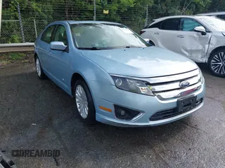 2010 Ford Fusion Hybrid z VIN 3FADP0L31AR287178, wystawiony jako IAAI lot #42471647 z przebiegiem 104 108 mil mil oraz . Historia ofert i sprzedaży dostępna na DreamBid. Obrazek 1.