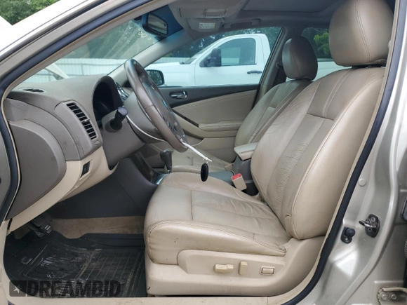 2010 Nissan Altima S with VIN 1N4AL2AP0AC163126, listed as a Copart auction lot 58383855 with 127,444 mi miles and Salvage title. Bid and sale history available at DreamBid. Image 7.