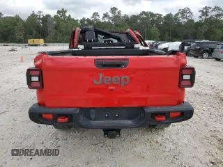 2020 Jeep Gladiator Rubicon z VIN 1C6JJTBG4LL167159, wystawiony jako Copart lot #54992395 z przebiegiem 73 906 mil mil oraz Szkoda całkowita • Salvage title. Historia ofert i sprzedaży dostępna na DreamBid. Obrazek 6.