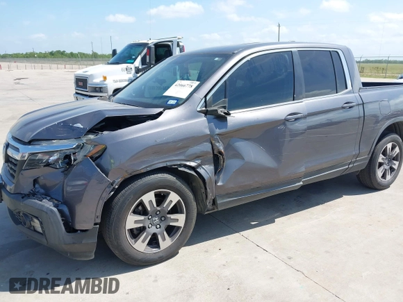 2019 Honda Ridgeline RTL with VIN 5FPYK2F59KB004653, listed as a IAAI auction lot 42066778 with 90,144 mi miles and . Bid and sale history available at DreamBid. Image 6.