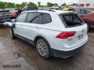 2018 Volkswagen Tiguan S with VIN 3VV1B7AX2JM120062, listed as a IAAI auction lot 41904852 with 166,909 mi miles. Bid and sale history available at carsss.com. Image 3.