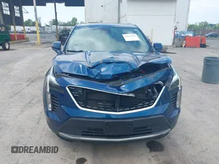 2019 Cadillac XT4 AWD Premium Luxury with VIN 1GYFZDR48KF148405, listed as a IAAI auction lot 42475624 with 88,630 mi miles and . Bid and sale history available at DreamBid. Image 12.