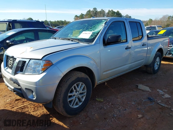 2015 Nissan Frontier SV with VIN 1N6AD0FR0FN711897, listed as a IAAI auction lot 41586254 with 106,326 mi miles and . Bid and sale history available at DreamBid. Image 2.