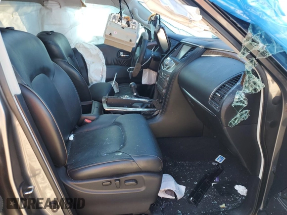 2017 Infiniti QX80 with VIN JN8AZ2NF9H9641632, listed as a Copart auction lot 66588634 with 103,172 mi miles and Salvage Title. Bid and sale history available at carsss.com. Image 7.