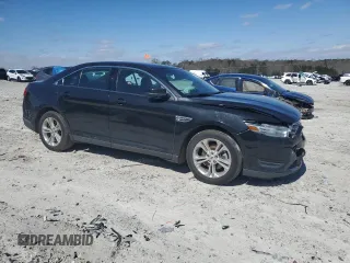 2014 Ford Taurus SEL z VIN 1FAHP2E82EG150298, wystawiony jako Copart lot #49546245 z przebiegiem 147 956 mil mil oraz Szkoda całkowita • Salvage title. Historia ofert i sprzedaży dostępna na DreamBid. Obrazek 4.