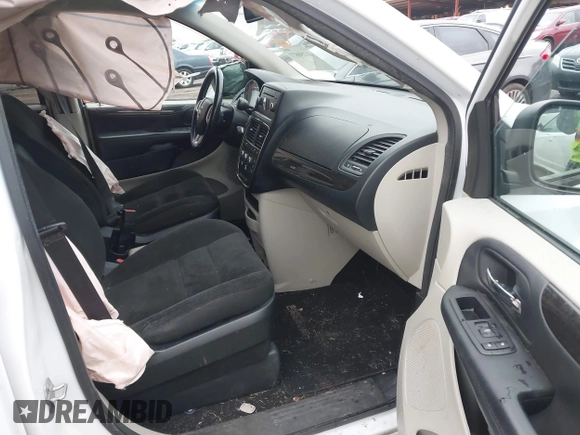 2017 Dodge Grand Caravan SE with VIN 2C4RDGBG9HR824594, listed as a IAAI auction lot 41250877 with 117,588 mi miles and . Bid and sale history available at DreamBid. Image 5.