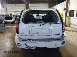 2005 GMC Envoy SLE z VIN 1GKDT13S452360609, wystawiony jako Copart lot #56188495 z przebiegiem 180 046 mil mil oraz Szkoda całkowita • Salvage title. Historia ofert i sprzedaży dostępna na DreamBid. Obrazek 6.