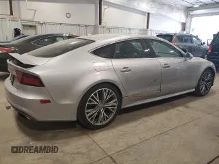 2016 Audi A7 3.0 Prestige with VIN WAU2GAFC7GN104801, listed as a Copart auction lot 64997833 with 74,427 mi miles. Bid and sale history available at carsss.com. Image 3.