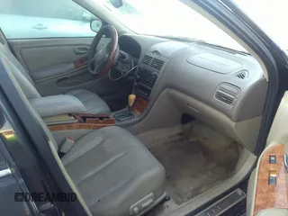 2004 Infiniti I35 with VIN JNKDA31AX4T204329, listed as a IAAI auction lot 41777648 with 182,373 mi miles. Bid and sale history available at carsss.com. Image 5.