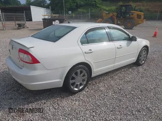 2009 Mercury Milan Premier z VIN 3MEHM081X9R613789, wystawiony jako IAAI lot #42354892 z przebiegiem 294 467 mil mil oraz . Historia ofert i sprzedaży dostępna na DreamBid. Obrazek 4.