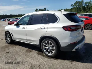 2021 BMW X5 xDrive40i z VIN 5UXCR6C0XM9E49285, wystawiony jako Copart lot #60897325 z przebiegiem 57 314 mil mil oraz Szkoda całkowita • Salvage title. Historia ofert i sprzedaży dostępna na DreamBid. Obrazek 2.