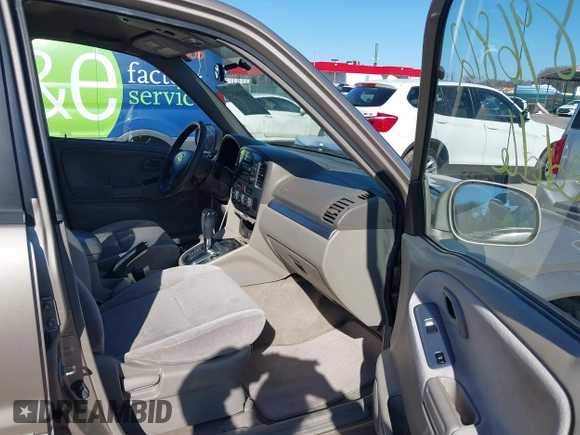 2005 Suzuki Grand Vitara LX with VIN JS3TD62V454200331, listed as a IAAI auction lot 41896812 with 122,974 mi miles and . Bid and sale history available at DreamBid. Image 5.