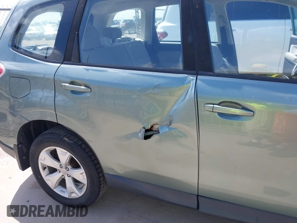 2016 Subaru Forester 2.5i z VIN JF2SJABC1GH559783, wystawiony jako IAAI lot #42749416 z przebiegiem 165 972 mil mil oraz . Historia ofert i sprzedaży dostępna na DreamBid. Obrazek 6.