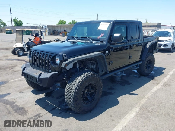 2020 Jeep Gladiator Sport S with VIN 1C6HJTAGXLL123540, listed as a IAAI auction lot 42453999 with 27,855 mi miles and . Bid and sale history available at DreamBid. Image 18.