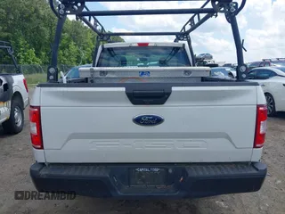 2018 Ford F-150 XL with VIN 1FTEX1CB5JFE55932, listed as a IAAI auction lot 42298917 with 143,923 mi miles and . Bid and sale history available at DreamBid. Image 16.