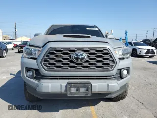 2020 Toyota Tacoma SR5 with VIN 3TMAZ5CN2LM137991, listed as a Copart auction lot 60317895 with 98,054 mi miles and Salvage title. Bid and sale history available at DreamBid. Image 5.