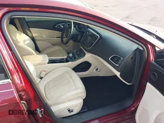 2015 Chrysler 200 C with VIN 1C3CCCCB6FN571544, listed as a IAAI auction lot 39932825 with 144,399 mi miles and . Bid and sale history available at DreamBid. Image 5.