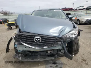 2016 Mazda CX-5 Touring with VIN JM3KE4CY9G0647226, listed as a Copart auction lot 51566405 with 77,785 mi miles and Salvage Title. Bid and sale history available at carsss.com. Image 5.