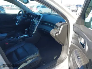 2014 Chevrolet Malibu LTZ with VIN 1G11J5SX5EF215539, listed as a IAAI auction lot 41636911 with 110,484 mi miles. Bid and sale history available at carsss.com. Image 5.