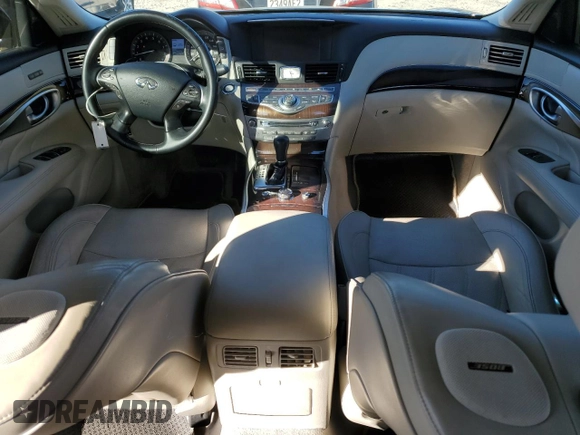 2015 Infiniti Q70 with VIN JN1BY1AR3FM562841, listed as a Copart auction lot 88765475 with 204,039 mi miles and Salvage title. Bid and sale history available at DreamBid. Image 8.