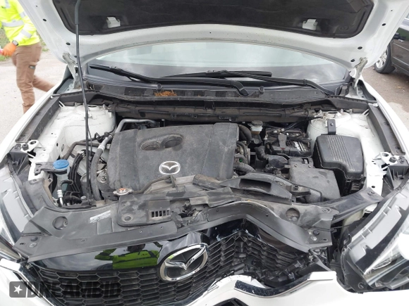 2015 Mazda CX-5 Touring with VIN JM3KE2CY3F0550624, listed as a IAAI auction lot 41931268 with 51,588 mi miles and . Bid and sale history available at carsss.com. Image 10.