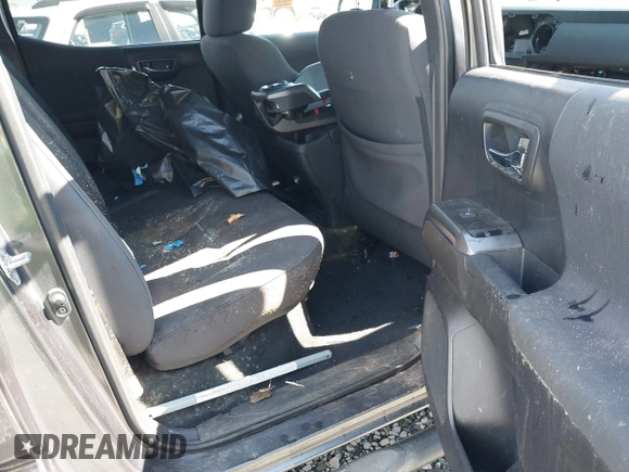 2019 Toyota Tacoma SR z VIN 3TMCZ5AN9KM232882, wystawiony jako IAAI lot #41879314 z przebiegiem Nie podano mil oraz . Historia ofert i sprzedaży dostępna na DreamBid. Obrazek 8.